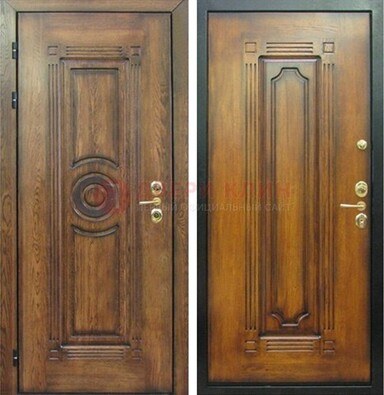 Коричневая металлическая дверь с массивом дуба с рисунком ДМД-10 в Одинцово