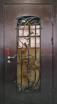 Металлическая дверь со стеклом и ковкой ДСК-95 для магазина в Одинцово